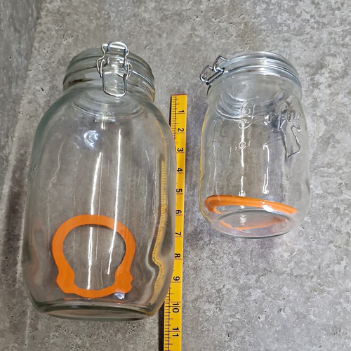 Pair glass clip top - of,